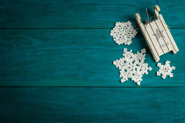Christmas toy sledge and snowflakes