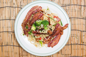 Spicy bacon spaghetti on the plate