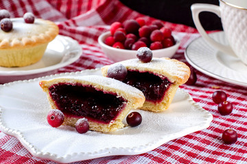 The pieces of the pie with cranberries.