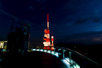 big communication antenna towers on the mountain