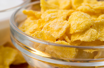 Defocused and blurred image of a glass cup with cornflakes