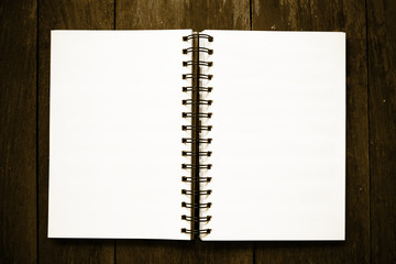 Business organizer notebook on wooden table