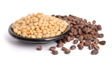 Shelled pine nuts with oil.