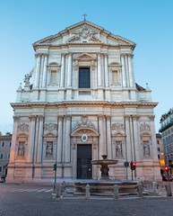 Fototapeta na wymiar Rome - The baroque portal of church Basilica di Sant Andrea della Valle at dusk.