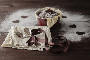 chocolate muffin on a wooden table