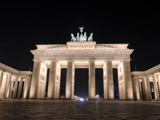 Tourists visit Brandenburger Tor in Berlin at night