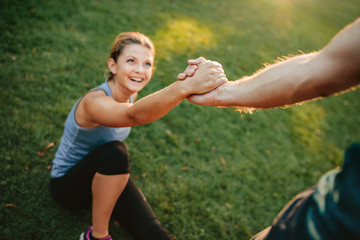 Man helping her girlfriend