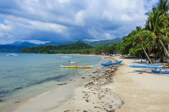 Sandy beach in front of the entrance to the New wonder of the world, the Puerto Princesa underground river, Palawan, Philippines