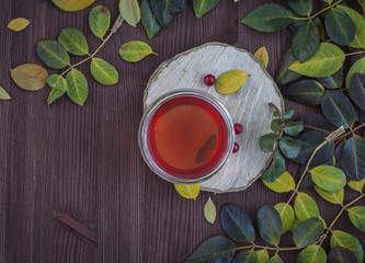 Herbal tea on the wooden brown table