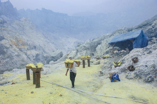 Fully loaded baskets of sulphur ready to be carried  out of the Ijen Volcano, Java, Indonesia