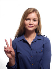Woman with peace sign.