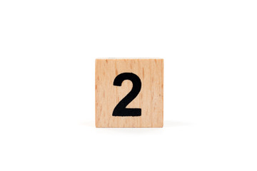 Wooden block Number two on white background