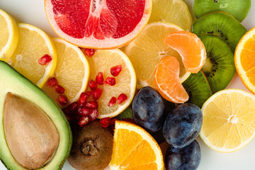 Healthy fresh sliced fruits and citruses
