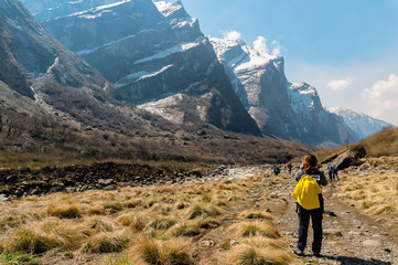 Traveler with Backpack in Himalaya mountains.