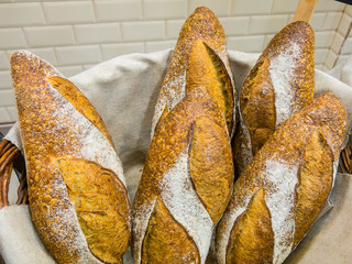 Delicious bread in a basket at a bakery