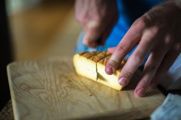 Obraz na płótnie Canvas Cutting Cheese
