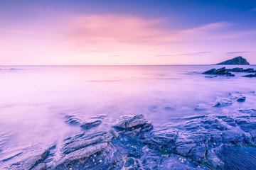 blue and pink sky at sunset on beach