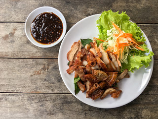 Street Thai food, roasted pork including small pig intestines an