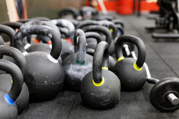 Close up heap of dumbbells in the gym.
