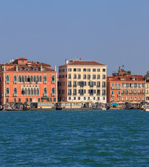 Fototapeta na wymiar Colorful weathered facades of old venetian buildings
