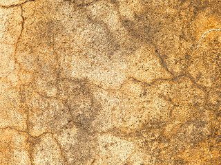 Orange concrete crack wall texture background