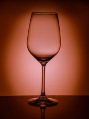 The beautiful glass made wine glass wine with reflection
