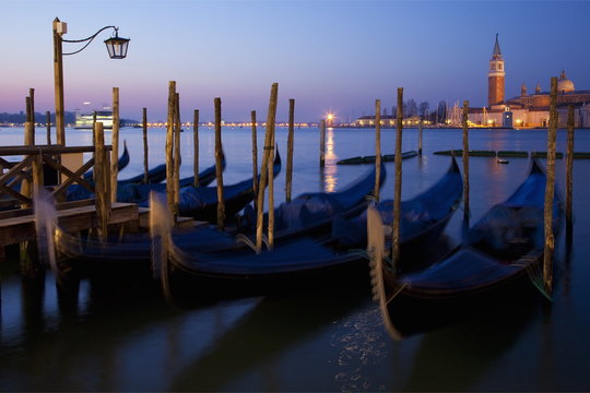 Daybreak view of gondolas from Piazzetta San Marco to Isole of San Giorgio Maggiore, Venice, Veneto