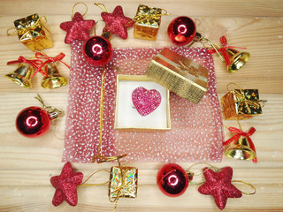 christmas gift heart composition on wooden background