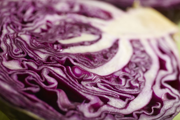 a head of red cabbage sliced in half