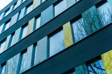 facade with some colorful windows from office or apartment building