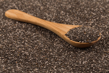 Chia seeds in wooden spoon