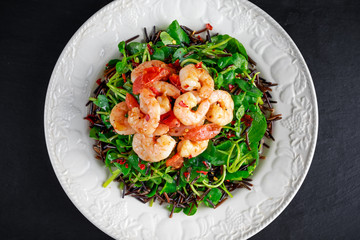 Fresh Healthy Prawns black rice salad on white plate