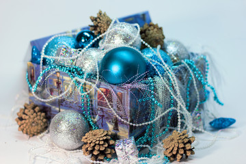 box with Christmas decorations white and blue