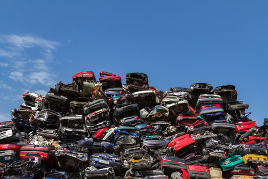 Stacked cars on a junkyard