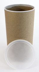 Cardboard packaging canister with plastic lid removed.