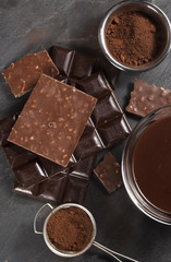 Various chocolate bars, cacao and melt chocolate.