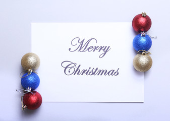 Christmas text and color ball isolated on white background