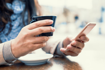 Close up of woman using smart phone