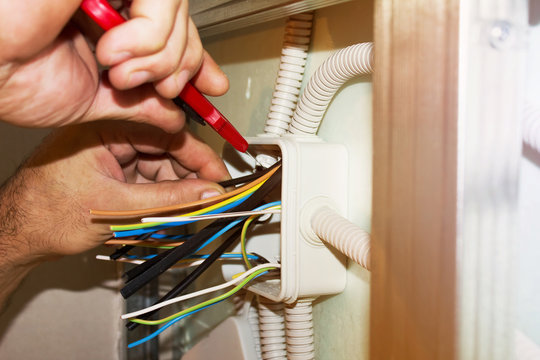 Electricians clears wire for electricity installation