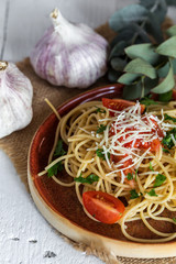 Spaguetti with tomato cheese and oregano