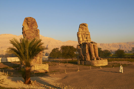Colossi of Memnon, carved to represent the 18th dynasty pharaoh Amenhotep III, West Bank of the River Nile, Thebes, Egypt