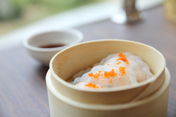 Chinese food dim sum in bamboo basket