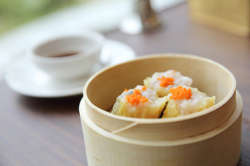 Chinese food dim sum in bamboo basket