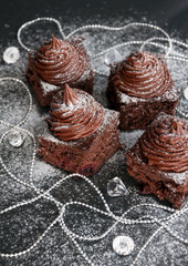 Brownie cake with chocolate cream - Christmas dessert idea for party, blank space for text