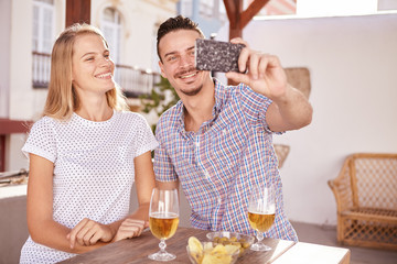Beautiful couple posing for a selfie