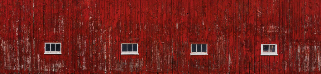 Red barn wall with windows panorama