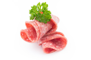 Salami sausage slices isolated on white background.