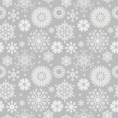 Cute seamless pattern with snowflakes isolated on light grey bac