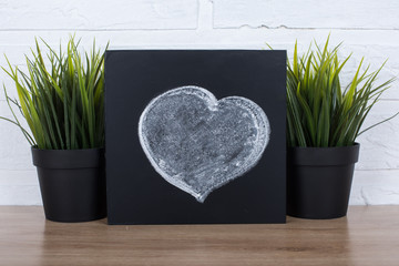 Chalkboard drawing of heart.