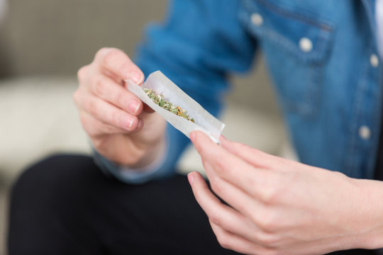 Closeup of joint being rolled